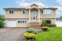 Welcome 27 Suzanne Lane, a sprawling hi ranch in the heart of for sale in Bethpage New York Nassau County County on GolfHomes.com