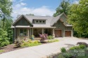 A masterpiece of mountain luxury living with sweeping mountain for sale in Flat Rock North Carolina Henderson County County on GolfHomes.com