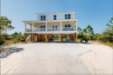 Welcome to Swell Rider, a stunning Fortified Gold 5-bedroom for sale in Gulf Shores Alabama Baldwin County County on GolfHomes.com