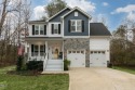 Step into your dream home nestled on a picturesque half-acre for sale in Raleigh North Carolina Wake County County on GolfHomes.com