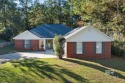 Experience modern living in this beautifully remodeled brick for sale in Daphne Alabama Baldwin County County on GolfHomes.com