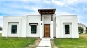 Live the lifestyle you've always dreamed of at the beautiful for sale in Weslaco Texas Hidalgo County County on GolfHomes.com