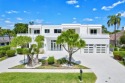 Built in 2020 and custom designed and upgraded post-build, this for sale in Boca Raton Florida Palm Beach County County on GolfHomes.com
