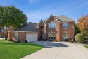 This EAST FACING two-story traditional has great curb appeal and for sale in Mckinney Texas Collin County County on GolfHomes.com