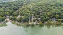 1st TIER ON THE LAKE! Nestled in a Gated Community--Enjoy Lake for sale in Bonner Springs Kansas Wyandotte County County on GolfHomes.com
