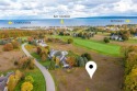 With views of Lake Michigan, this flat open parcel is situated for sale in Petoskey Michigan Emmet County County on GolfHomes.com