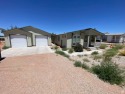 Great 50 x 80  garage compound with 1501 sqf three bedroom home for sale in Moab Utah Grand County County on GolfHomes.com
