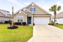 Step inside this inviting home and be welcomed by a spacious for sale in Bolivia North Carolina Brunswick County County on GolfHomes.com