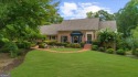 Nestled on a private, one-acre lot just moments from Highway 400 for sale in Atlanta Georgia Fulton County County on GolfHomes.com
