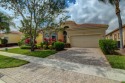 WOW! Be impressed when you enter this 3 bedroom plus den 2.5 for sale in Delray Beach Florida Palm Beach County County on GolfHomes.com