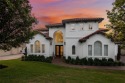 This custom home boasts captivating curb appeal and is an for sale in Austin Texas Travis County County on GolfHomes.com