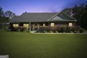 Live on vacation when you make 1653 Hawthorne Rd in the Shellman for sale in Townsend Georgia McIntosh County County on GolfHomes.com
