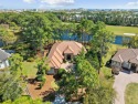 This exquisite lakefront home is a true standout, offering for sale in Destin Florida Okaloosa County County on GolfHomes.com