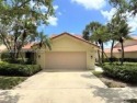 This stunning Mediterranean/Spanish-style home embodies elegance for sale in West Palm Beach Florida Palm Beach County County on GolfHomes.com
