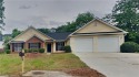 This renovated 3 bedroom, 2 bathroom home offers modern living for sale in Lithonia Georgia De Kalb County County on GolfHomes.com