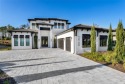 Introducing an exquisite custom home situated on a sprawling for sale in Bella Collina Florida Lake County County on GolfHomes.com