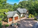 Located behind the gates, and a short golf cart ride to all for sale in Lake Lure North Carolina Rutherford County County on GolfHomes.com