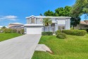 This charming spacious Augusta model pool home sits on an for sale in Jupiter Florida Martin County County on GolfHomes.com