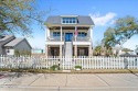 This raised house, perched gracefully on a 1-acre lot, offers an for sale in Pass Christian Mississippi Harrison County County on GolfHomes.com