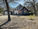There's a lot to love about this cozy haven nestled in the for sale in Pottsboro Texas Grayson County County on GolfHomes.com
