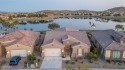Priced below appraised value! Nestled within a gated community for sale in Goodyear Arizona Maricopa County County on GolfHomes.com