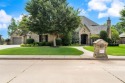 Nestled in the prestigious Oak Tree community.  Well designed for sale in Edmond Oklahoma Oklahoma County County on GolfHomes.com
