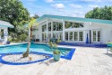 Welcome to Plantation! Behind the gates of Coco Plum Estates and for sale in Plantation Florida Broward County County on GolfHomes.com