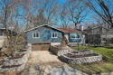 This updated mid-century raised ranch offers the tranquility of for sale in Madison Wisconsin Dane County County on GolfHomes.com