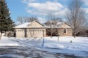 Nestled on a quiet cul-de-sac, this 4-bedroom, 3-bath walkout for sale in Annandale Minnesota Wright County County on GolfHomes.com