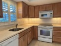 Beautiful 1st floor golf course condo in the City of Atlantis for sale in Atlantis Florida Palm Beach County County on GolfHomes.com