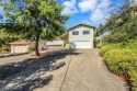 ACROSS FROM THE LAKE!! This 4 bed + Large Bonus Room / 2 bath for sale in Hidden Valley Lake California Lake County County on GolfHomes.com