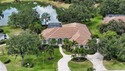 Set on more than half an acre with peaceful lake views, this for sale in Sarasota Florida Sarasota County County on GolfHomes.com