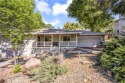 On approximately 1/3 acre. 3 Bed, 3 Bath and Den. This 1988 for sale in Hidden Valley Lake California Lake County County on GolfHomes.com