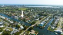 This is your opportunity to own one, of only 11 waterfront point for sale in North Palm Beach Florida Palm Beach County County on GolfHomes.com