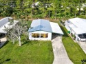 This is your opportunity to own a special home. The updated for sale in Barefoot Bay Florida Brevard County County on GolfHomes.com