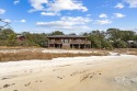 Discover the perfect opportunity to own a spacious waterfront for sale in Gulf Shores Alabama Baldwin County County on GolfHomes.com