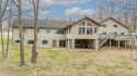 Custom-built home on the 16th green of top-rated Timberstone for sale in Iron Mountain Michigan Dickinson County County on GolfHomes.com