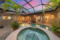 Experience the pinnacle of indoor-outdoor living at 20060 for sale in Estero Florida Lee County County on GolfHomes.com