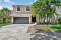 Spacious 5BR, 2.5BA home in Madison Green, Royal Palm Beach for sale in Royal Palm Beach Florida Palm Beach County County on GolfHomes.com