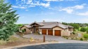 Completed in 2024, this residence enjoys a prime location along for sale in Prescott Arizona Yavapai County County on GolfHomes.com