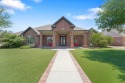 LUXURIOUS, 5 BEDROOM HOME IN GRASSLAND ESTATES WEST! THIS HOME for sale in Midland Texas Midland County County on GolfHomes.com