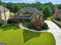 Experience resort-style living in this executive home, perfectly for sale in Dacula Georgia Gwinnett County County on GolfHomes.com