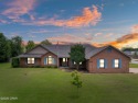 This spacious and beautifully updated 4-bedroom, 2.5-bath brick for sale in Lynn Haven Florida Bay County County on GolfHomes.com