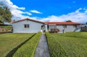 Welcome to 9480 Palmetto Club Ln E--an updated 4-bed, 2-bath for sale in Palmetto Bay Florida Miami-Dade County County on GolfHomes.com