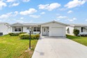 Nestled within 55+ Palm Beach Leisureville, this charming home for sale in Boynton Beach Florida Palm Beach County County on GolfHomes.com