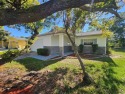 One or more photo(s) has been virtually staged. Nestled in the for sale in Hudson Florida Pasco County County on GolfHomes.com