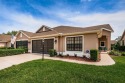 Welcome to your perfect retreat at 9636 Brookdale Dr., located for sale in New Port Richey Florida Pasco County County on GolfHomes.com