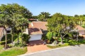 This spacious 2,494 square foot villa offers sweeping golf for sale in Boynton Beach Florida Palm Beach County County on GolfHomes.com