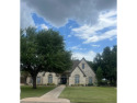 Nestled beneath an abundance of shade, located across the street for sale in Kingsland Texas Burnet County County on GolfHomes.com