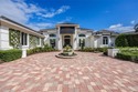 This extraordinary residence offers stunning lake and for sale in Naples Florida Collier County County on GolfHomes.com